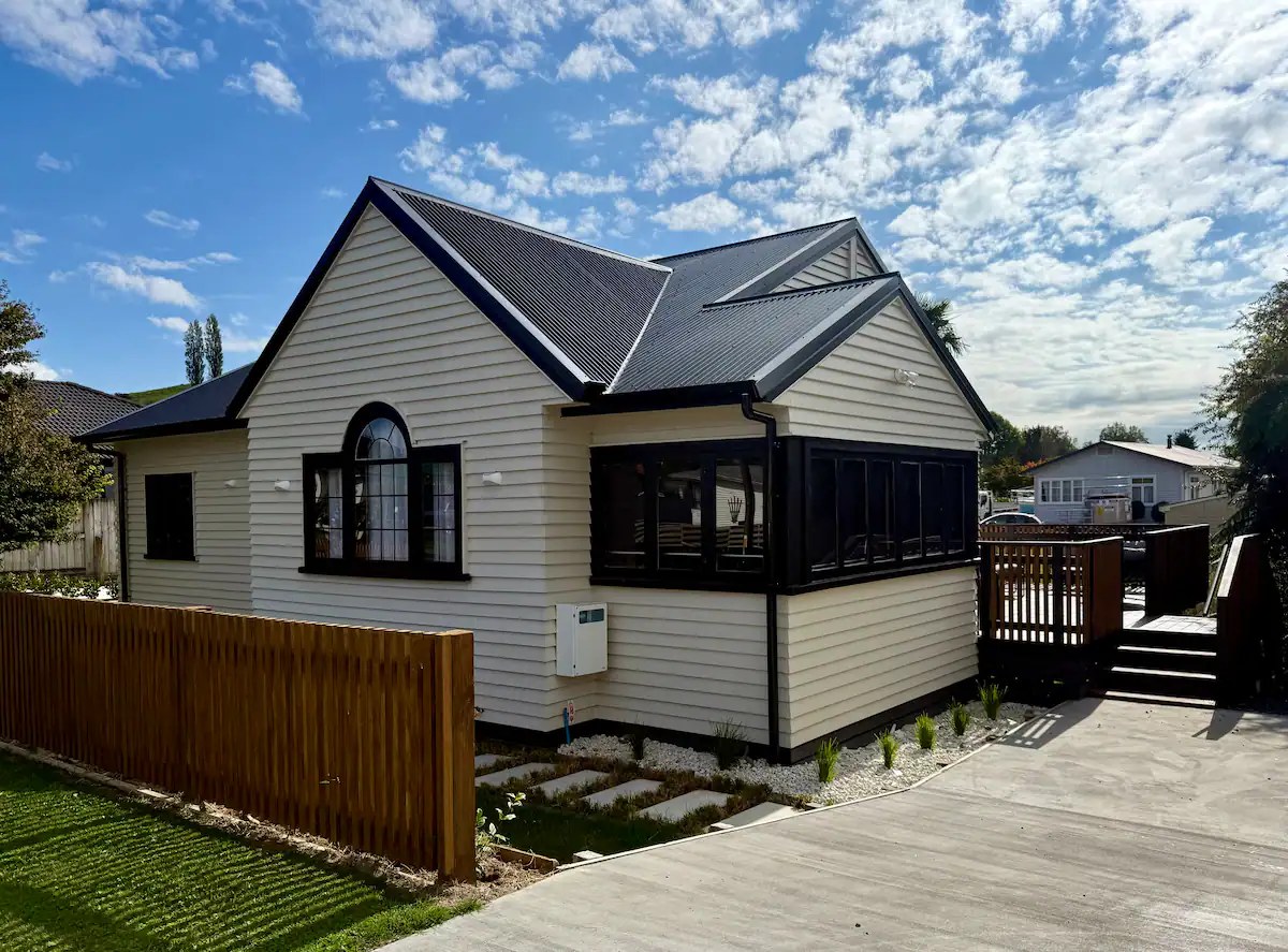 Possum House, with its character gables, arched window and sunny deck